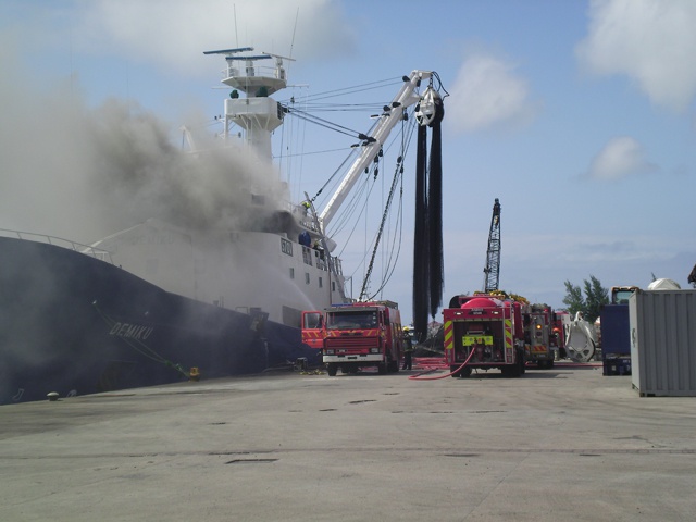Seychelles Fire services put out fire on Spanish fishing vessel docked in Port Victoria