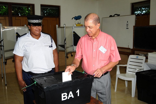 Incumbent President James Michel first candidate to cast vote in Seychelles 2015 presidential elections