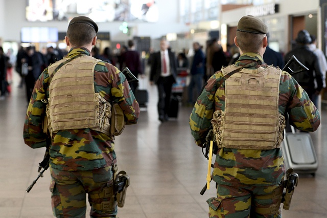 At least one dead as twin blasts rock Brussels airport