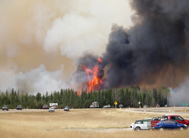 Canada oil output slashed due to Alberta wildfire