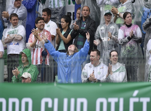 Brazil mourns fallen football team in pouring rain