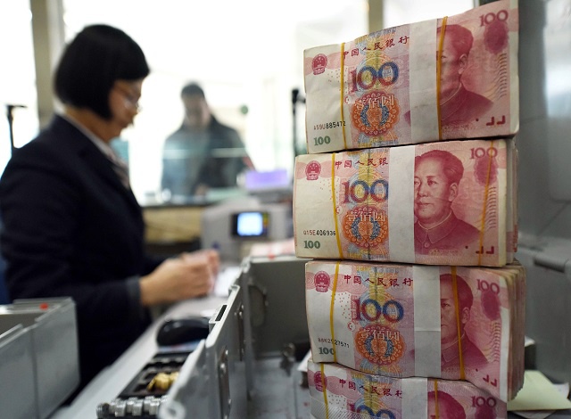 China expands forex basket, dilutes role of dollar