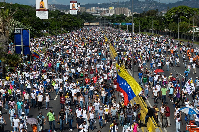 Up to 200,000 protesters march against Venezuela's Maduro