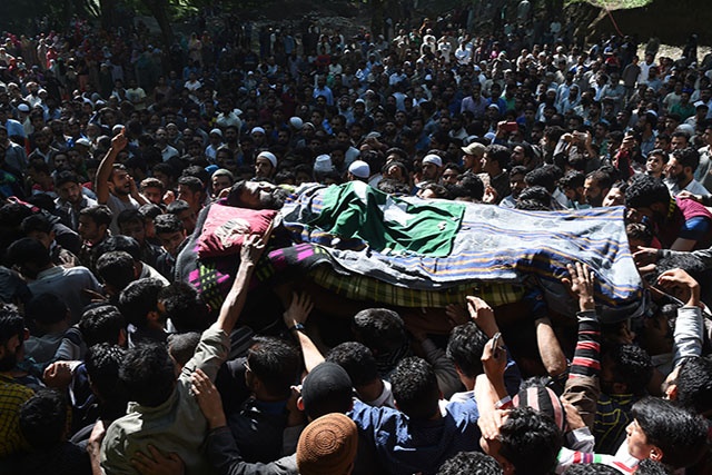 Indian Kashmir under Ramadan curfew after rebel leader's killing