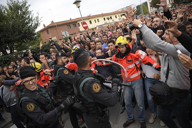 Police seize ballot boxes at Catalan polling stations: interior ministry