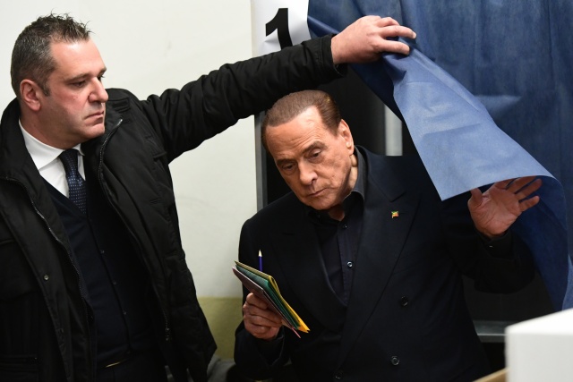 Berlusconi: Italy's comeback king on the ropes