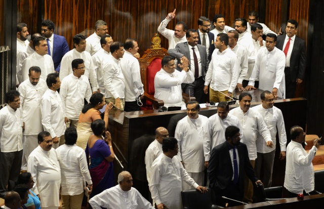 Sacked Sri Lanka PM seeks job back after parliament riot