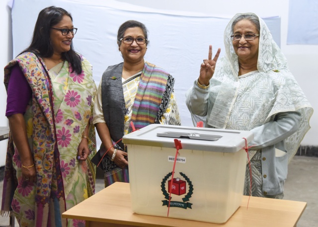 Bangladesh PM wins election landslide as opponents demand new vote