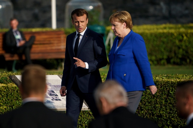 France, Germany seek closer bond with treaty ahead of Brexit