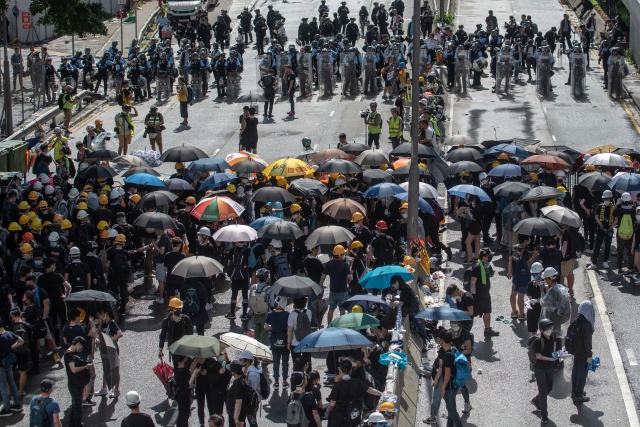 Hong Kong braces for mass rally on China handover anniversary