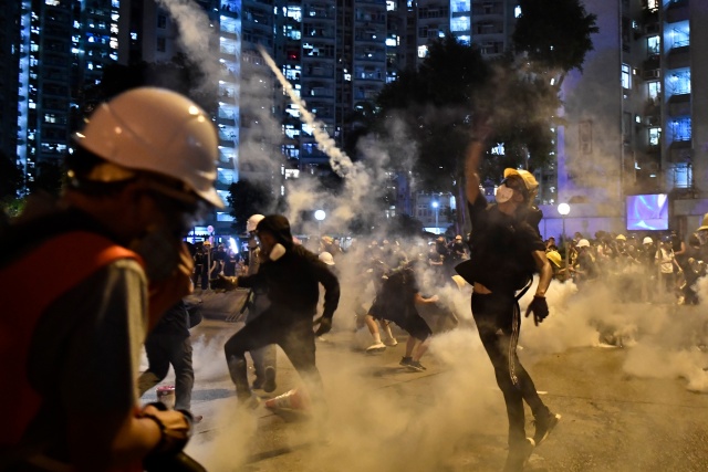 China warns Hong Kong protesters of 'immense strength' of government