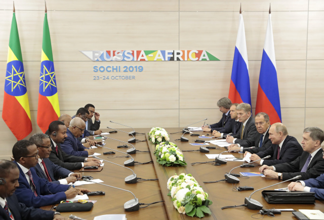 As Kremlin scrambles for Africa, Putin praises ties at major summit