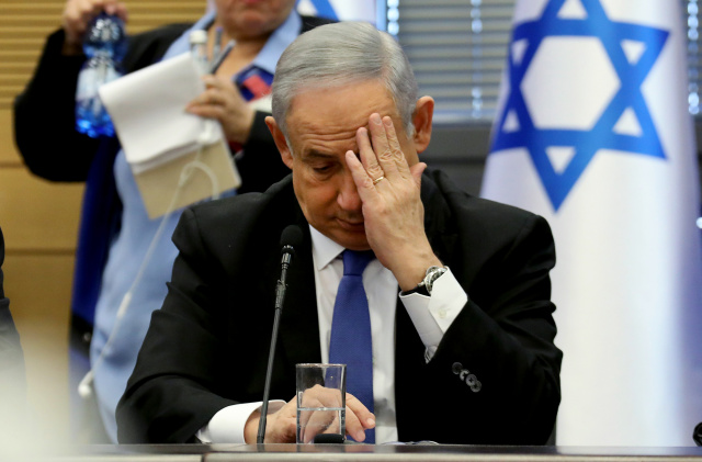 Israeli PM Netanyahu defiant after corruption indictment