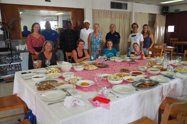 World-traveling sailors pause to learn how to cook authentic Creole food from Seychelles