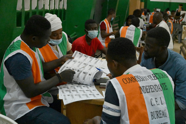 Ivory Coast president urges calm in tense election for third term