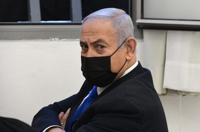 Israel's Netanyahu denies corruption charges as trial resumes