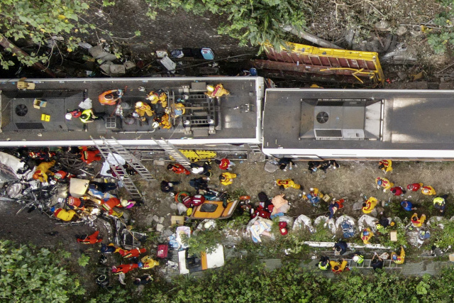 Taiwan mourns after deadliest train disaster in decades