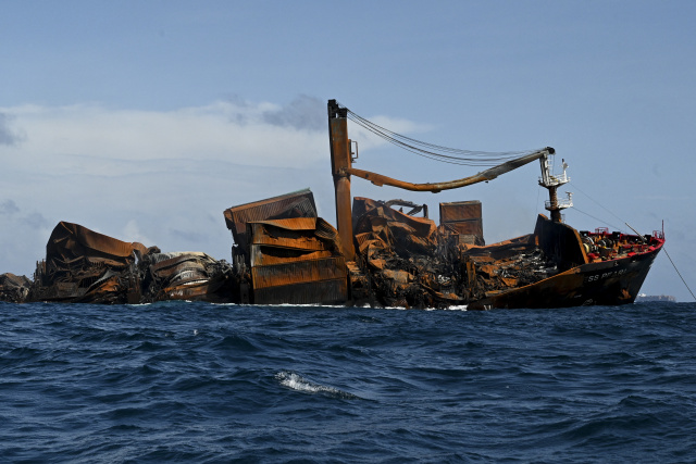 Burnt-out container ship sinking off Sri Lanka