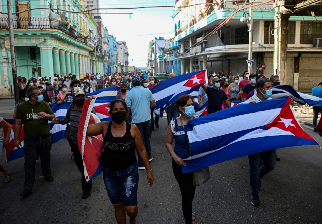 One Cuban dead, dozens arrested after unprecedented protests