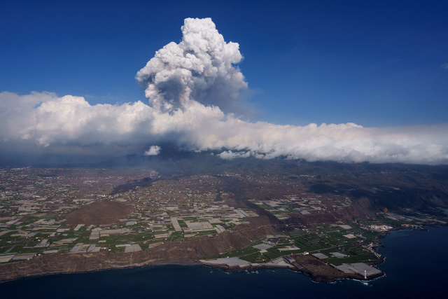 Canaries volcano lava reaches sea, raising toxic gas fears