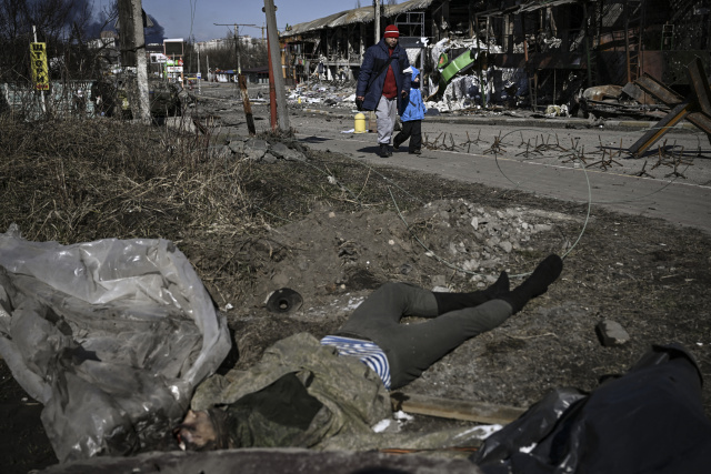 Russian forces squeeze Kyiv, surround Mariupol