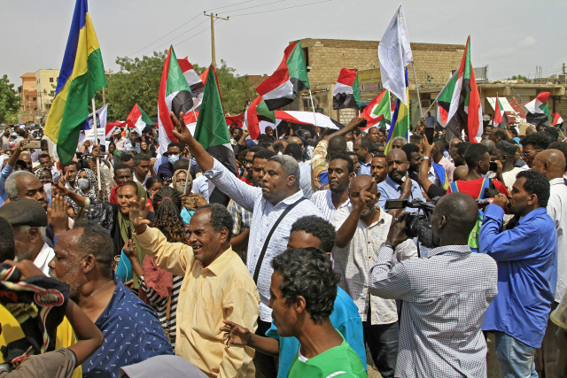 Hundreds rally in Sudan against coup, tribal violence