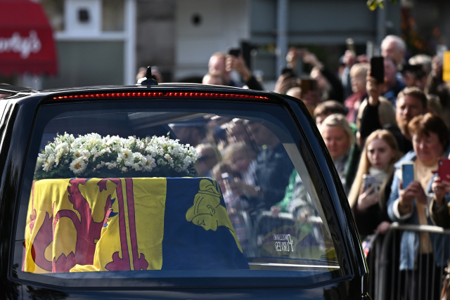 Queen Elizabeth II embarks on solemn final journey