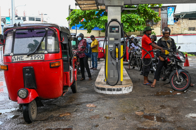 Bankrupt Sri Lanka slashes fuel prices