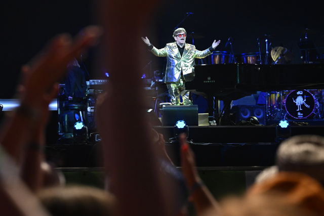 Elton John hails fans at emotional final farewell show