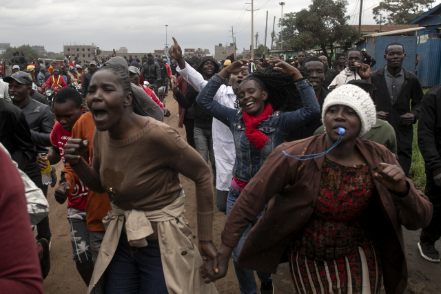 Kenya police fire tear gas as protesters defy ban