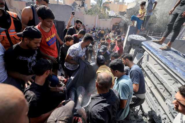 Israel says troops encircle Gaza City as Blinken visits
