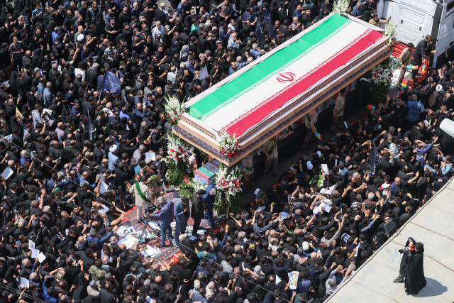 Big crowds in Iran capital for president's funeral