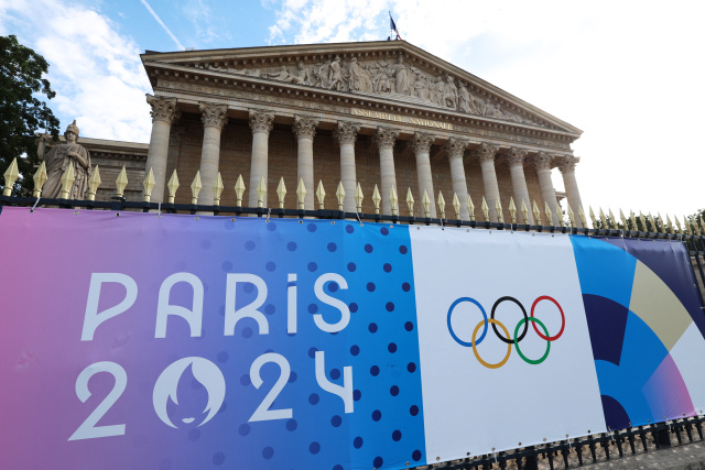 Central Paris locks down for Olympics as athletes arrive