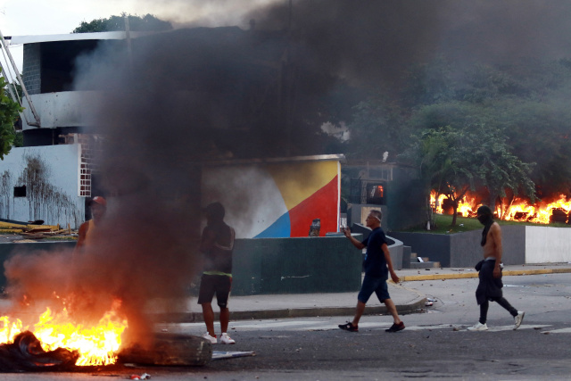 Venezuela protesters teargassed as opposition cries foul over Maduro reelection