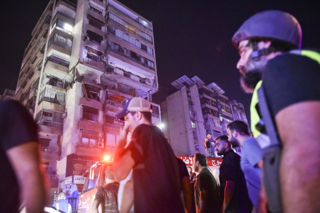 Israel hits apartment block in first strike on heart of Beirut